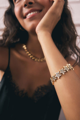 Lifestyle image of the Gold Star Bracelet