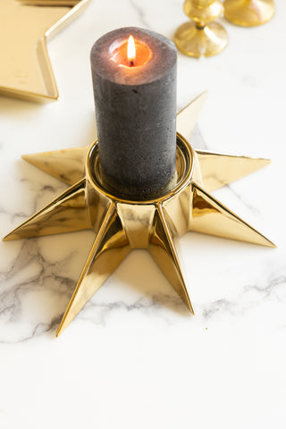 Gold star candle holder from birds eye view.