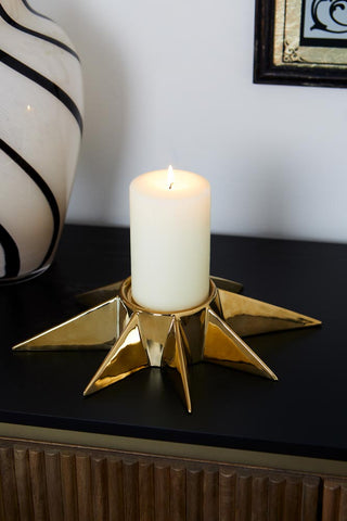 Lifestyle image of the Gold Star Candle Holder