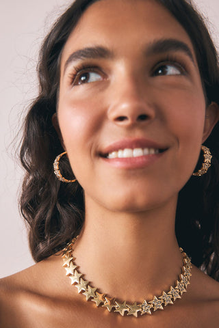 Close-up image of the Gold Star Hoop Necklace