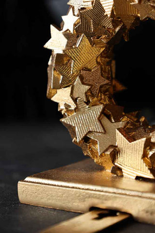 Close-up image of the Gold Stars Stocking Holder