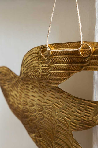 Image of the back of the Gold Swallow Hanging Ornament