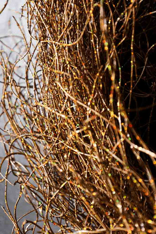 Close-up image of the Sparkly Gold Twig Christmas Wreath