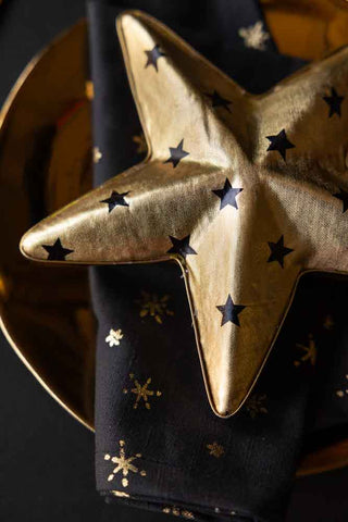 Close-up image of the Gold & Black Star Christmas Decoration