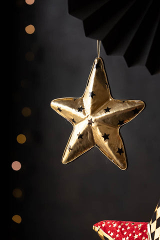 Lifestyle image of the Gold & Black Star Christmas Decoration
