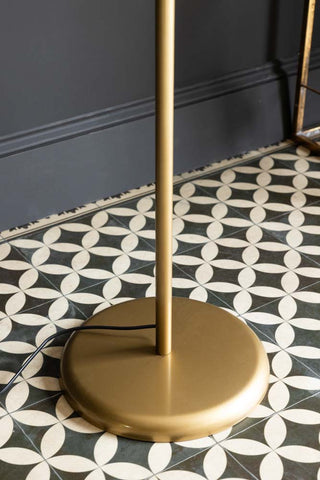 Detail image of the Gold & White Opaque Globe Floor Lamp.