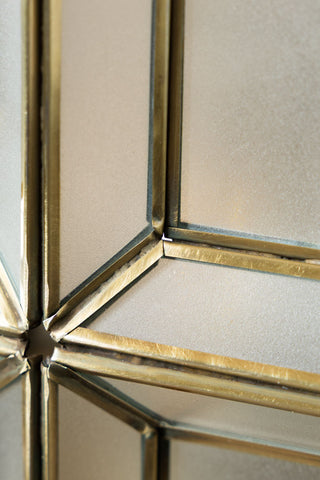Close up of the brass and glass detailing on the Gold Geometric Glass Table Lamp
