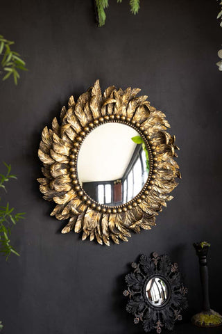 Lifestyle image of the Golden Feather Round Wall Mirror