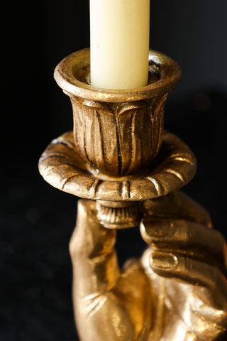Close-up image of the Gold Hand Candlestick Holder