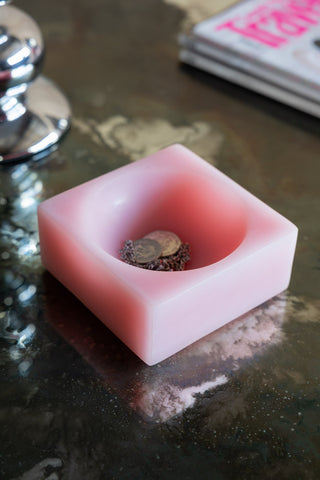 The HKLIVING Pink Modernist Cube Ornament shown on a foxed glass coffee table with jewellery and coins inside. 