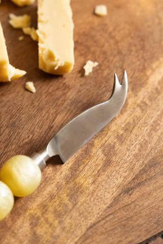 Close up image of the pronged cheese knife from the HKLIVING Yellow Bobble Cheese Knives Set. 