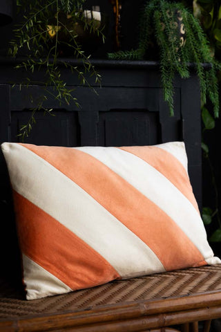 Lifestyle image of the HKliving Peach & Cream Stripe Velvet Cushion