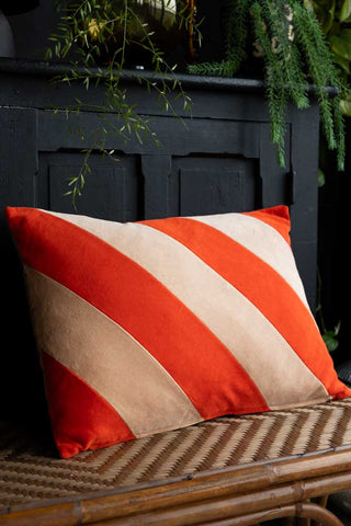 Lifestyle image of the HKliving Red & Pink Stripe Velvet Cushion