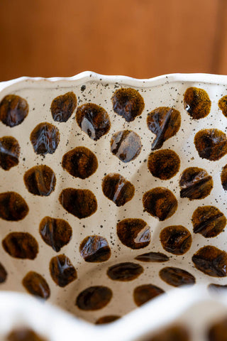 Image of the finish on the Handcrafted Brown Spotty Fruit Bowl