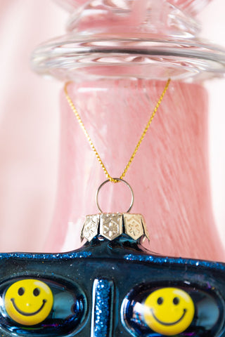 Detail image of the Happy Pill Glass Christmas Tree Decoration