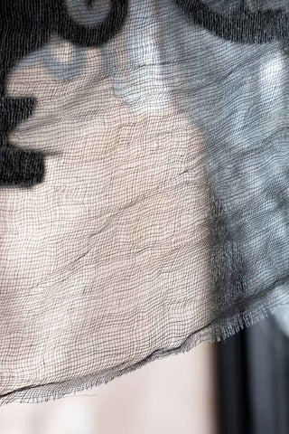The fabric on the Haunted House Paper Chandelier Decoration. 