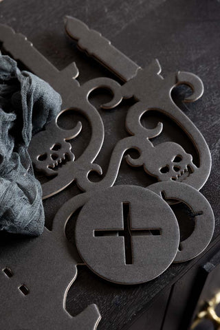 An image that shows how the Haunted House Paper Chandelier Decoration comes before assembled. 