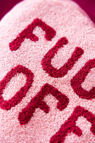 Close-up image of the Heart Shape 'Fuck Off' Microwaveable Wheat Bag