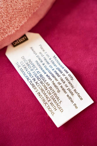 Image of the label on the Heart Shape 'Fuck Off' Microwaveable Wheat Bag