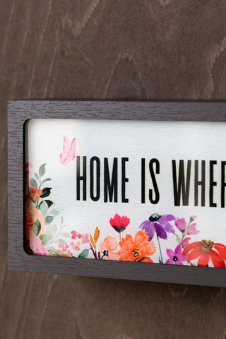 Close-up of the Home Is Where The Fuckers Aint Light Box.