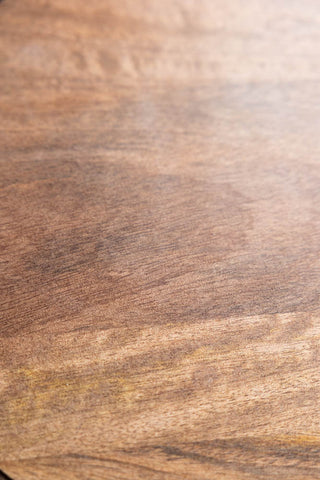 The wood grain of the Home Sweet Fucking Home Wooden Serving Board. 