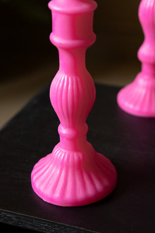 Detail of the Hot Pink Candlestick Shaped Candle - Medium, showing the pattern on the wax candle.
