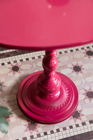 The patterned base of the Hot Pink Heart Metal Side Table.
