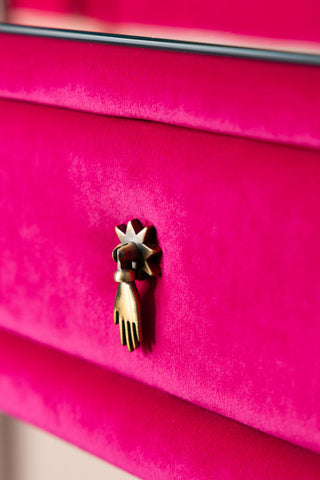 Image shows the hand-shaped gold star handles on the Hot Pink Velvet Dressing Table. 