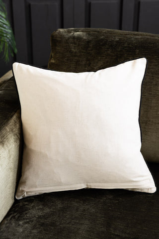 The reverse side of the In This House We Swear Embroidered Cushion.