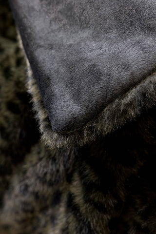 The soft underside of the Jaguar Faux Fur Throw 