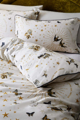 Detail image of the Jane's Rose Duvet Cover and Pillow Case Set styled on a bed.