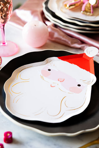 Lifestyle image of the Joyful Father Christmas Party Paper Plates