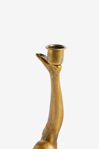 Close-up cutout image of the Kick Leg Candle Holder on a white background.