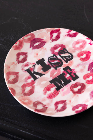 Close-up image of the Kiss Me Decorative Wall Plate
