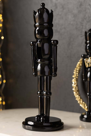Image of the large nutcracker in the Set Of 2 Black Christmas Nutcracker Decorations