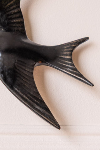 Close-up image of the Large Black Swallow Wall Decoration