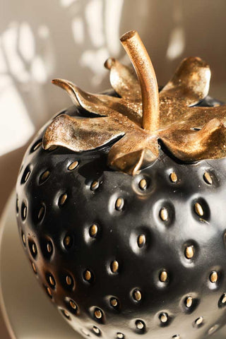 Image of the finish on the Large Black & Gold Strawberry Ornament