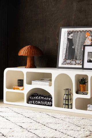 Image of the Large White Alcove Shelf with various decorative accessories displayed inside and on the top. 