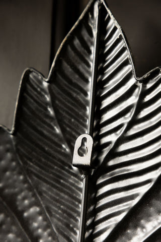 Close-up of te fixing on the reverse side of the Large Winged Milagro Mirror.