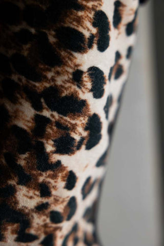 Image of the material for the Leopard Love Embroidered Star Christmas Stocking