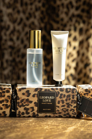The Leopard Love Hand & Body Beauty Cracker styled with the hand lotion and body mist on top.