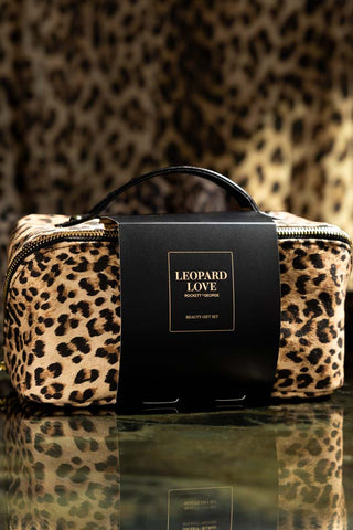 Close-up of the Leopard Love Makeup Bag Beauty Gift Set in its packaging.