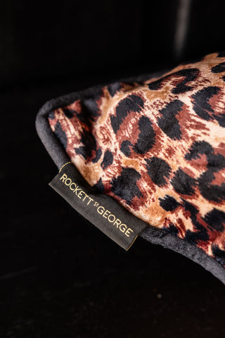 Image of the label on the Leopard Love Print Cushion
