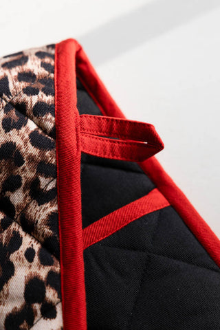 Close-up of the red trim on the Leopard Love Print & Red Detailing Oven Gloves.