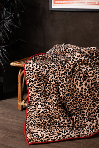 Image of the pattern on the Leopard Love Print with Red Reversible Quilt