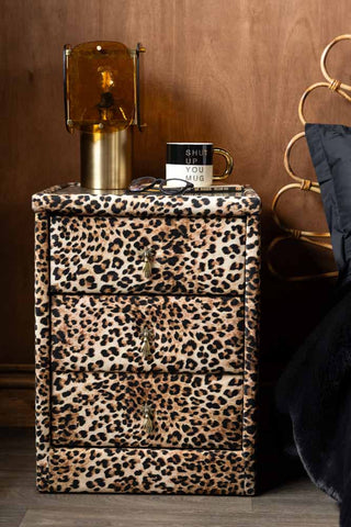 Lifestyle image of the Signature Leopard Print Velvet Bedside Table