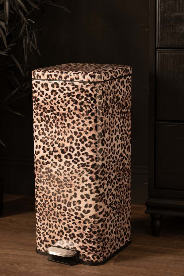 The Fabulous Leopard Print Pedal Bin styled against a black kitchen. 