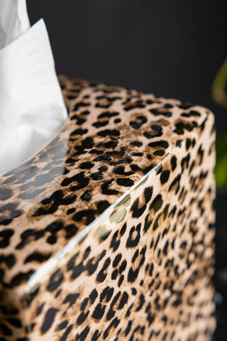 The leopard print pattern on the Leopard Print Tissue Box Holder. 