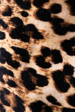 Close up detail of the leopard print velvet on the Leopard Print Velvet Makeup Bag. 