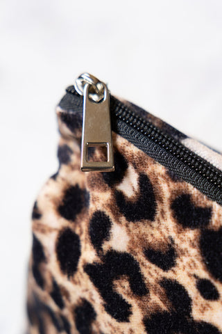 The zip on the Leopard Print Velvet Makeup Bag. 